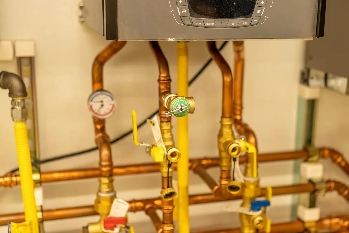 Licensed technician providing Emergency Plumbing for a homeowner in Champlain